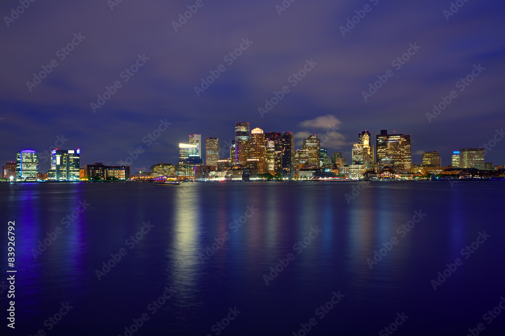 Boston skyline at sunset and river in Massachusetts