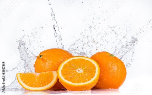 Oranges with water splash