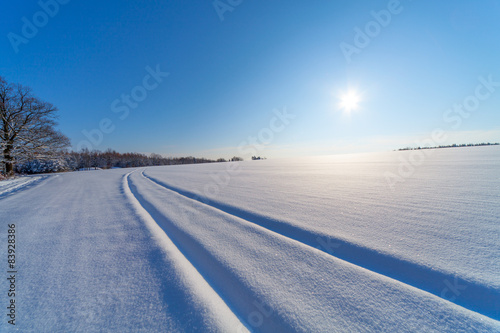 Sunrise on winter landscape. snow field