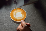 Making of cafe latte art,shape heart