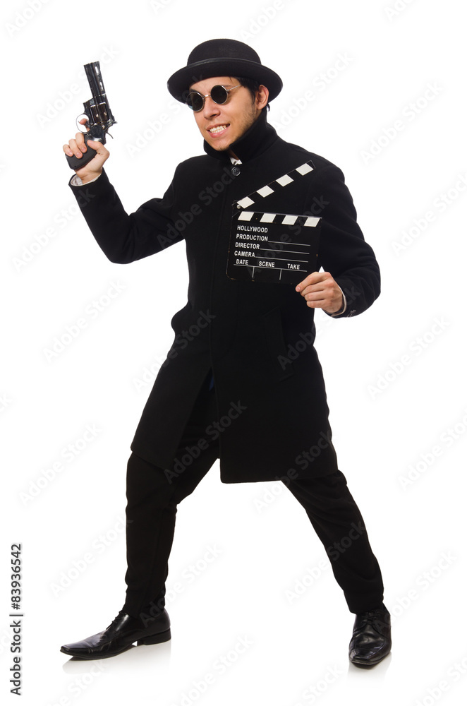Young man with gun and clapper-board isolated on white Young man with gun and clapper-board isolated on white