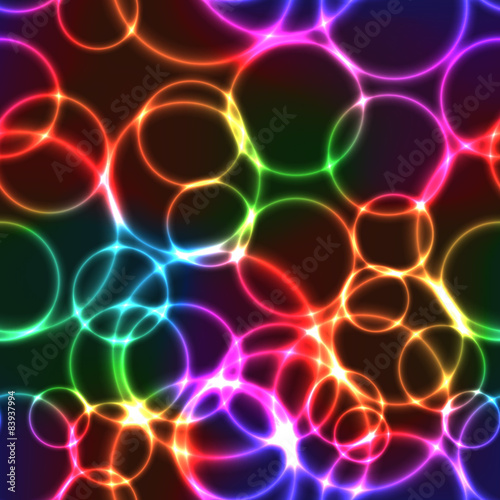 Neon rainbow color bright bubbles - seamless background
