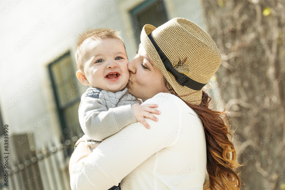 Fototapeta premium Young mother with her baby boy