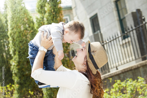 Young mother with her baby boy photo