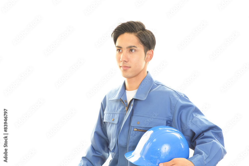 微笑む労働者