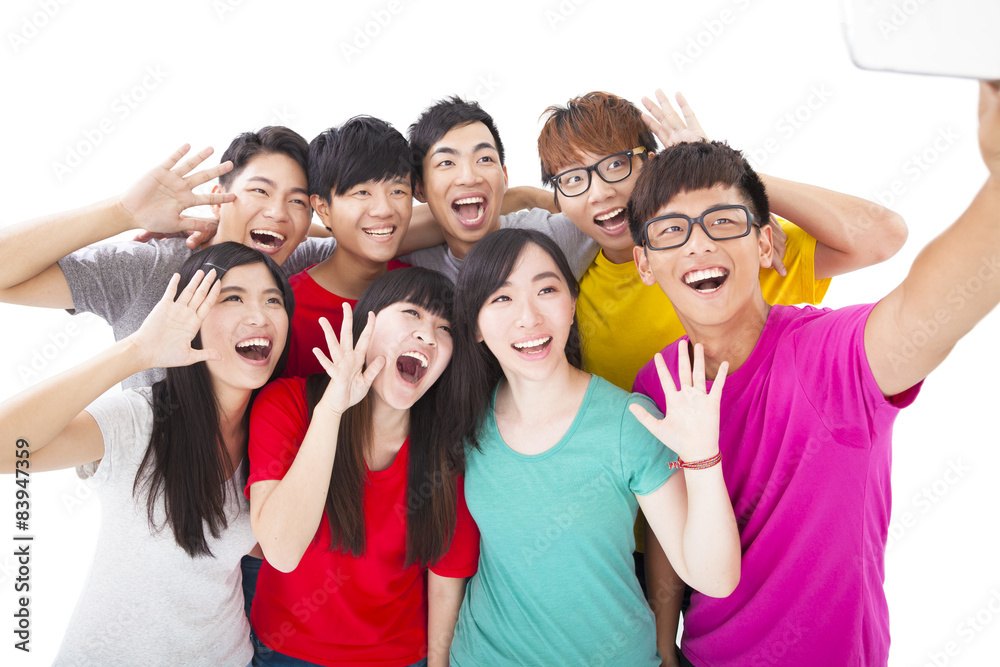 group of smiling friends with camera taking self photo group of smiling friends with camera taking self photo