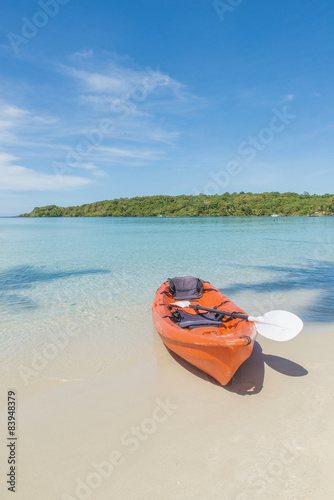 Summer, Travel, Vacation and Holiday concept - Orange kayaks on