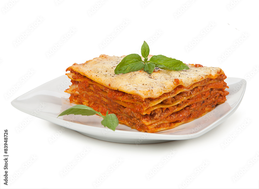 Tasty lasagna isolated on plate