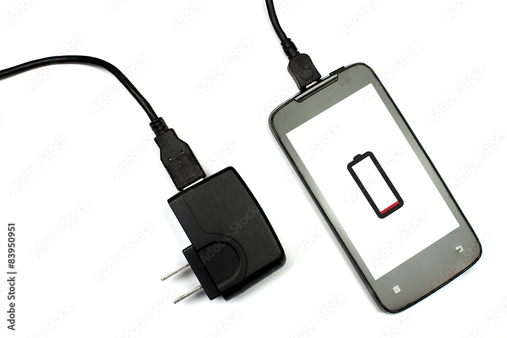 cellphone and charger on white background, isolated