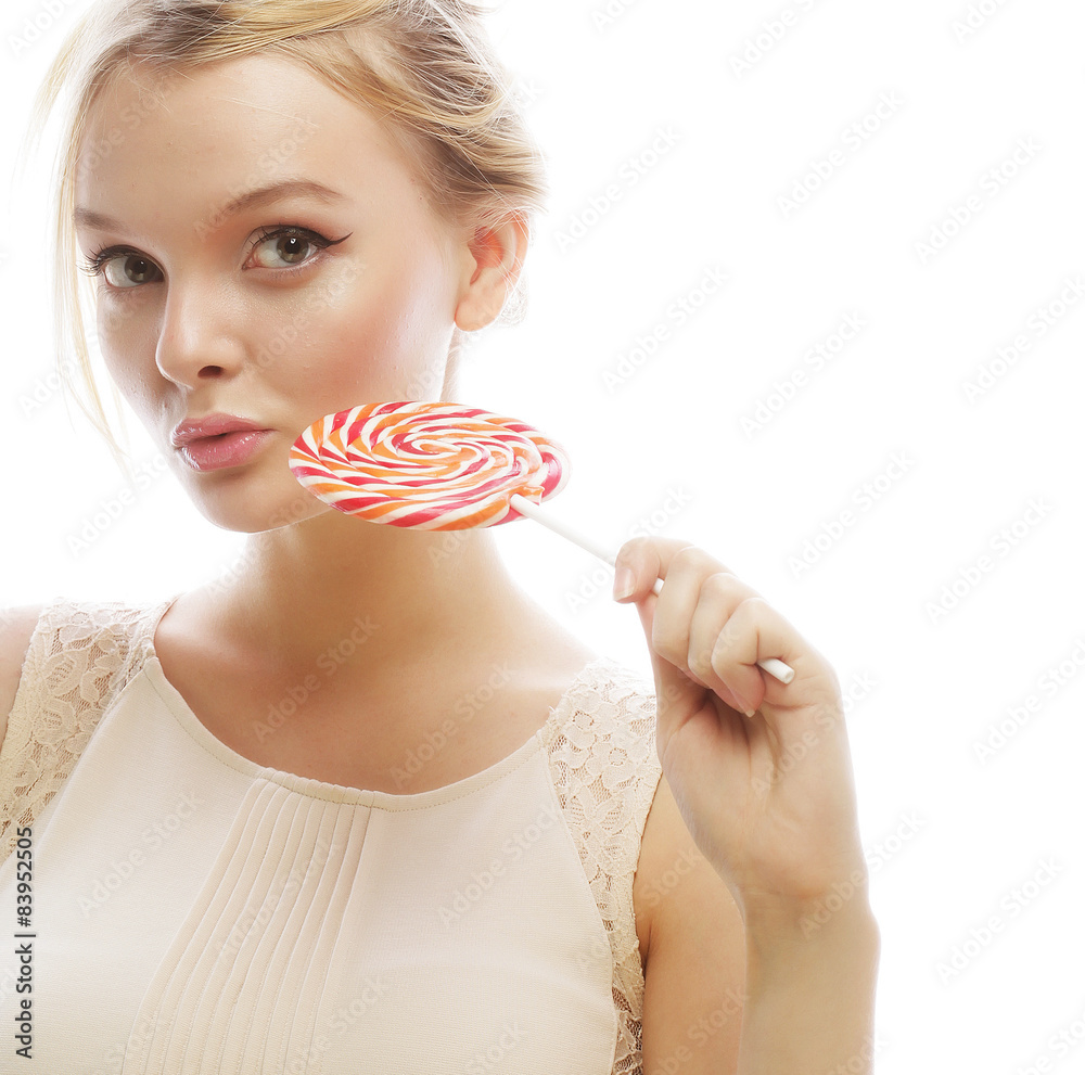 fashion blond woman  holding lollipop