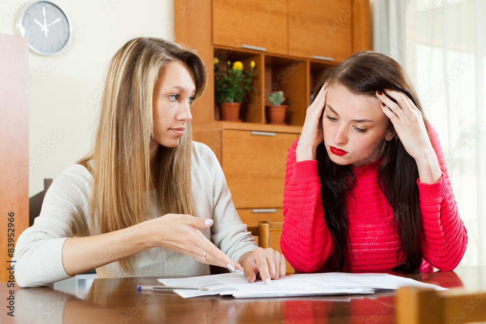 Fototapeta premium serious women with financial documents