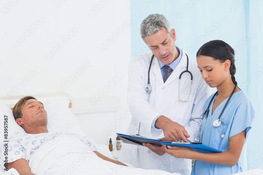Doctor explaining report to patient Doctor explaining report to patient