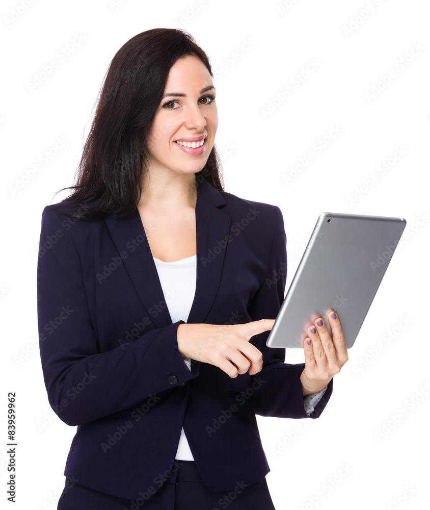 Brunette businesswoman use of digital tablet Brunette businesswoman use of digital tablet