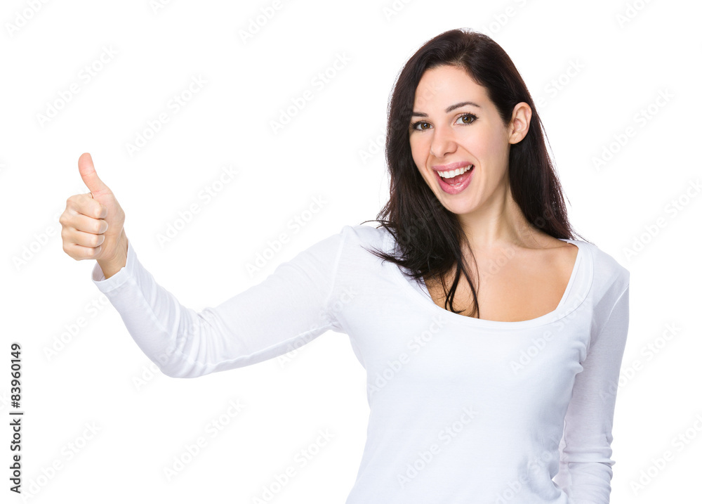 Brunette woman with thumb up gesture Brunette woman with thumb up gesture