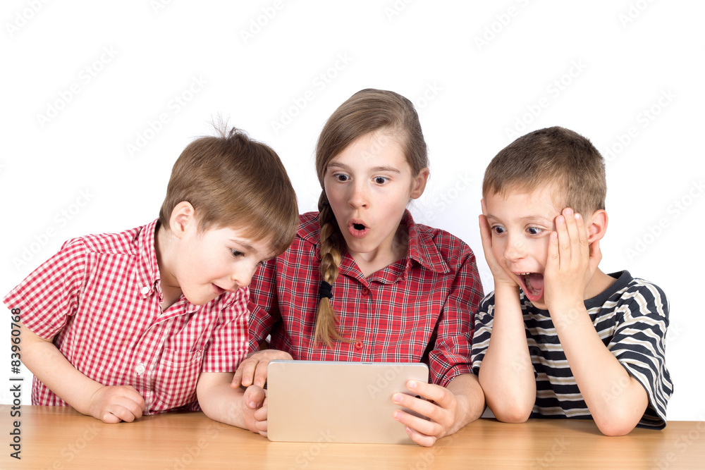 Group of Children Playing Exciting Game on Tablet Isolated Group of Children Playing Exciting Game on Tablet Isolated