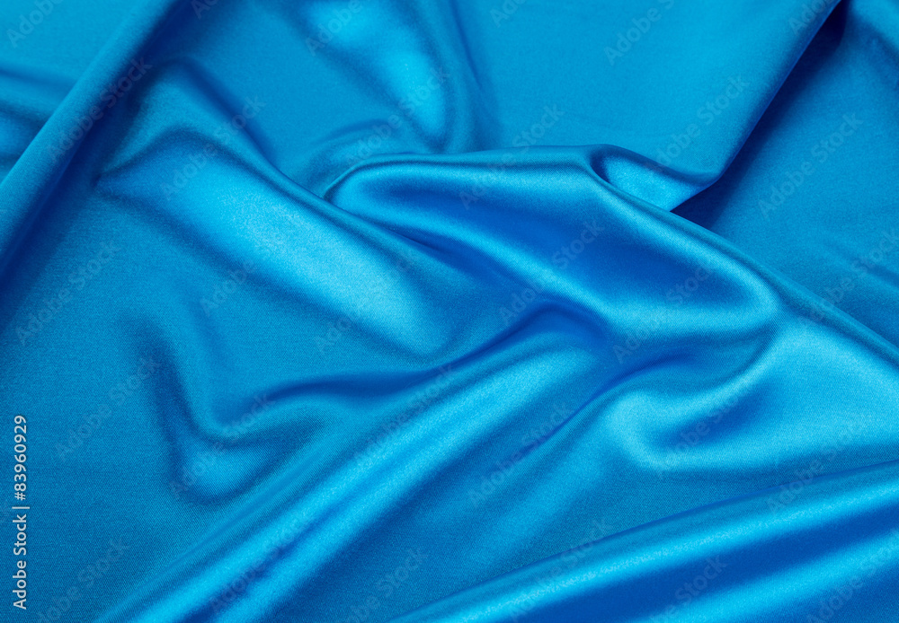 Blue silk soft folds of cloth. Blue silk soft folds of cloth.