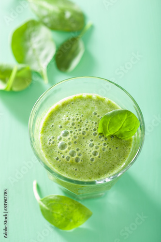 healthy green smoothie with spinach leaves