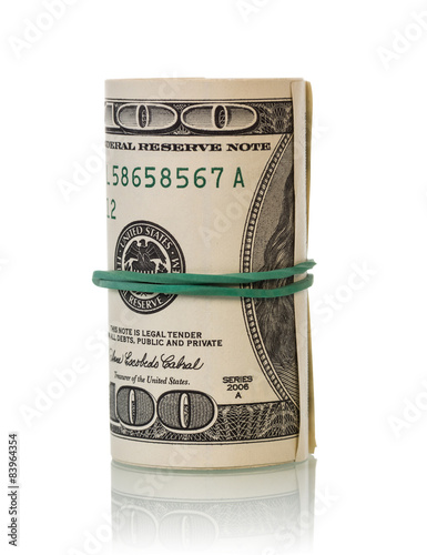 Fotografie Dollar bills rolled up
