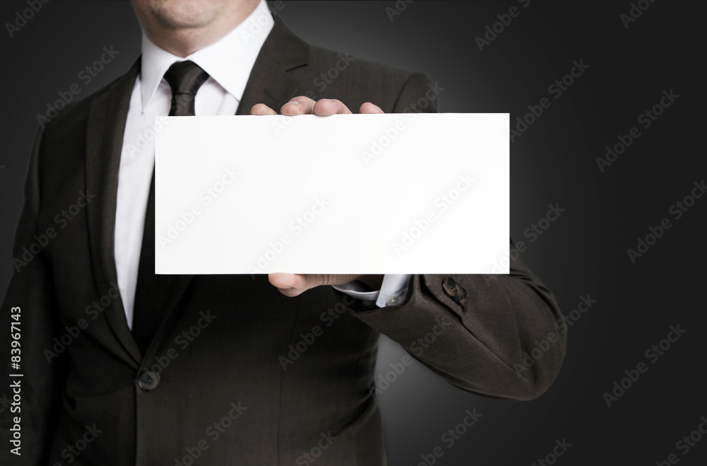 Leeres Schild wird von Geschäftsmann gehalten