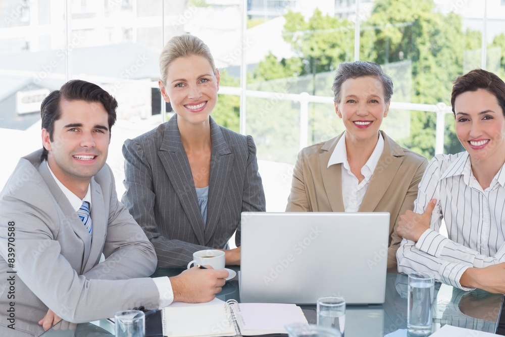 Business team working together on laptop Business team working together on laptop