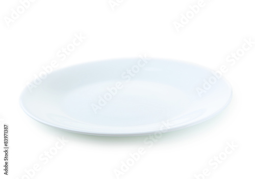 Empty white plate isolated on white