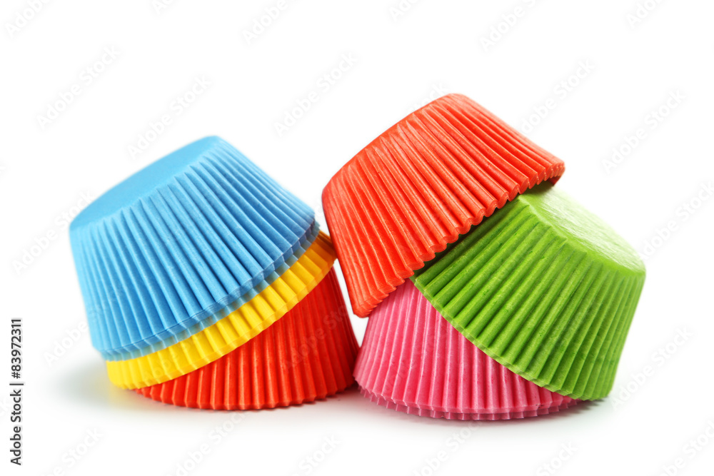 Empty colorful cupcake cases isolated on white Empty colorful cupcake cases isolated on white