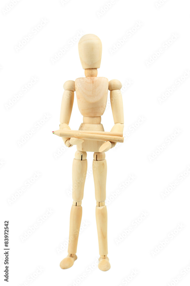 Wooden figure with pencil isolated on white Wooden figure with pencil isolated on white