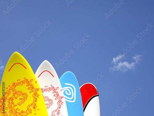Surfboards with sky behind