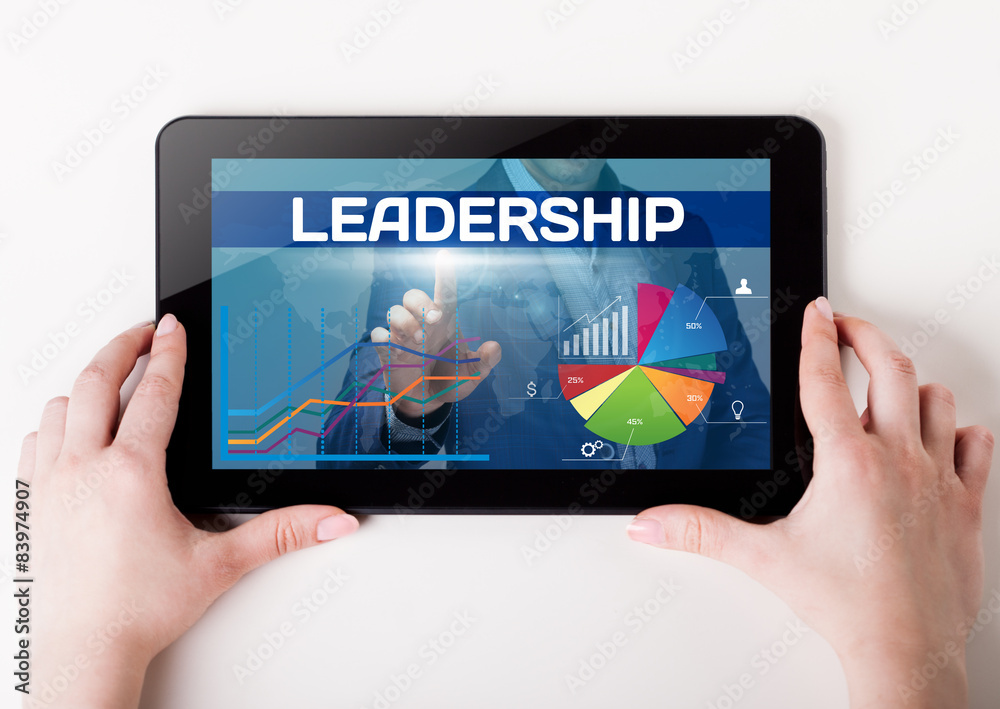 Girl holding a tablet pc which a man presses the virtual screen Girl holding a tablet pc which a man presses the virtual screen