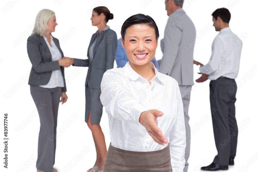 businesswoman offering handshake businesswoman offering handshake
