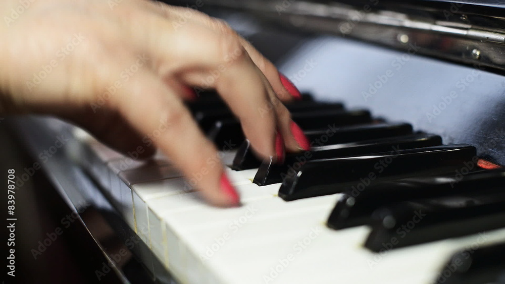 Woman playing the piano. Woman playing the piano.