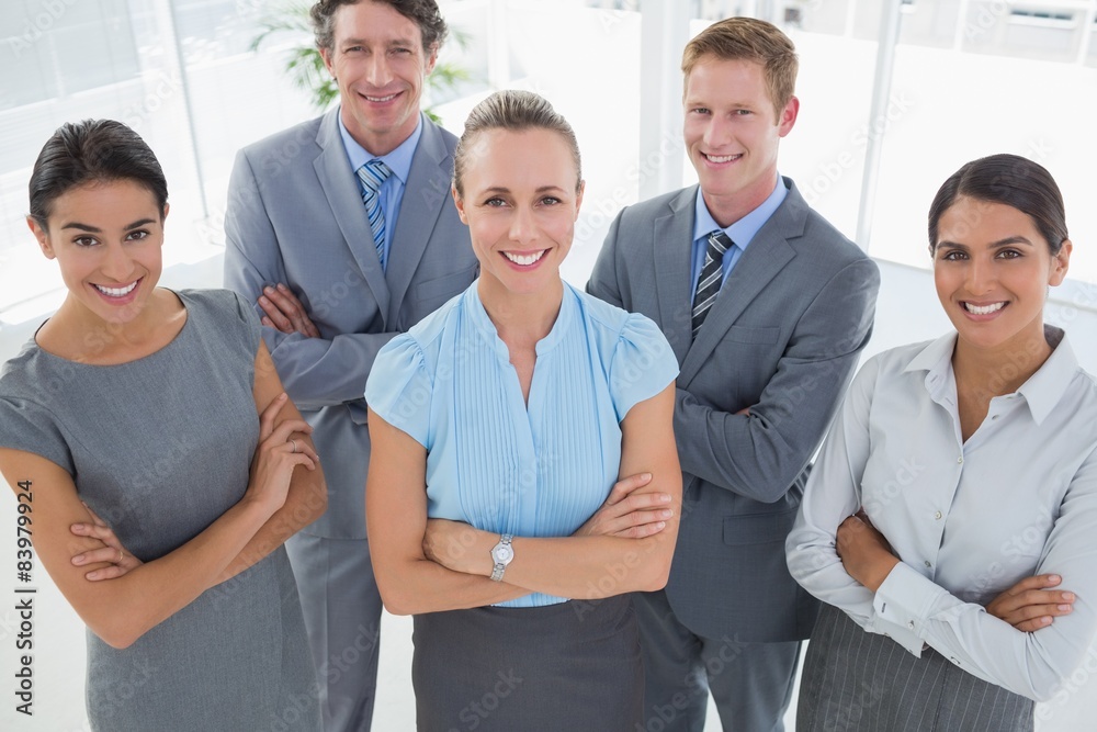 Business team smiling at camera