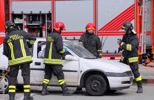 firefighters in action after the road accident