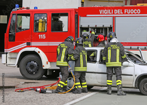 brave firefighters relieve an injured after a road accident