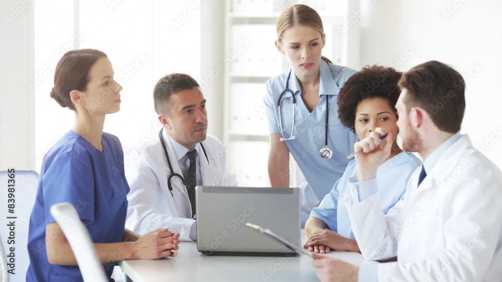 group of doctors with laptop meeting at hospital group of doctors with laptop meeting at hospital