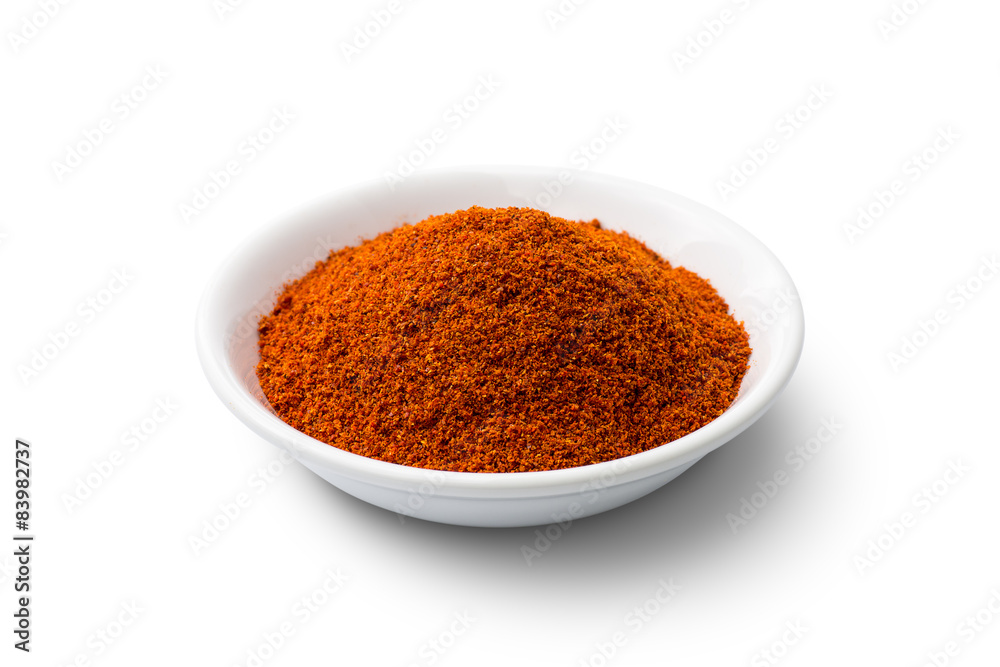 Cayenne pepper - Red chilli powder isolated on white background Cayenne pepper - Red chilli powder isolated on white background