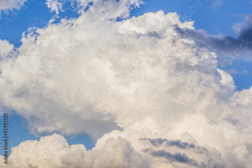 Blue sky with clouds many cubes