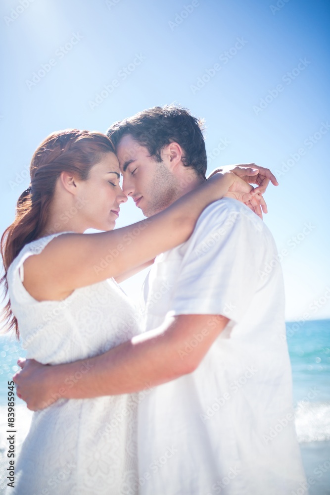 Happy couple hugging eyes closed Happy couple hugging eyes closed