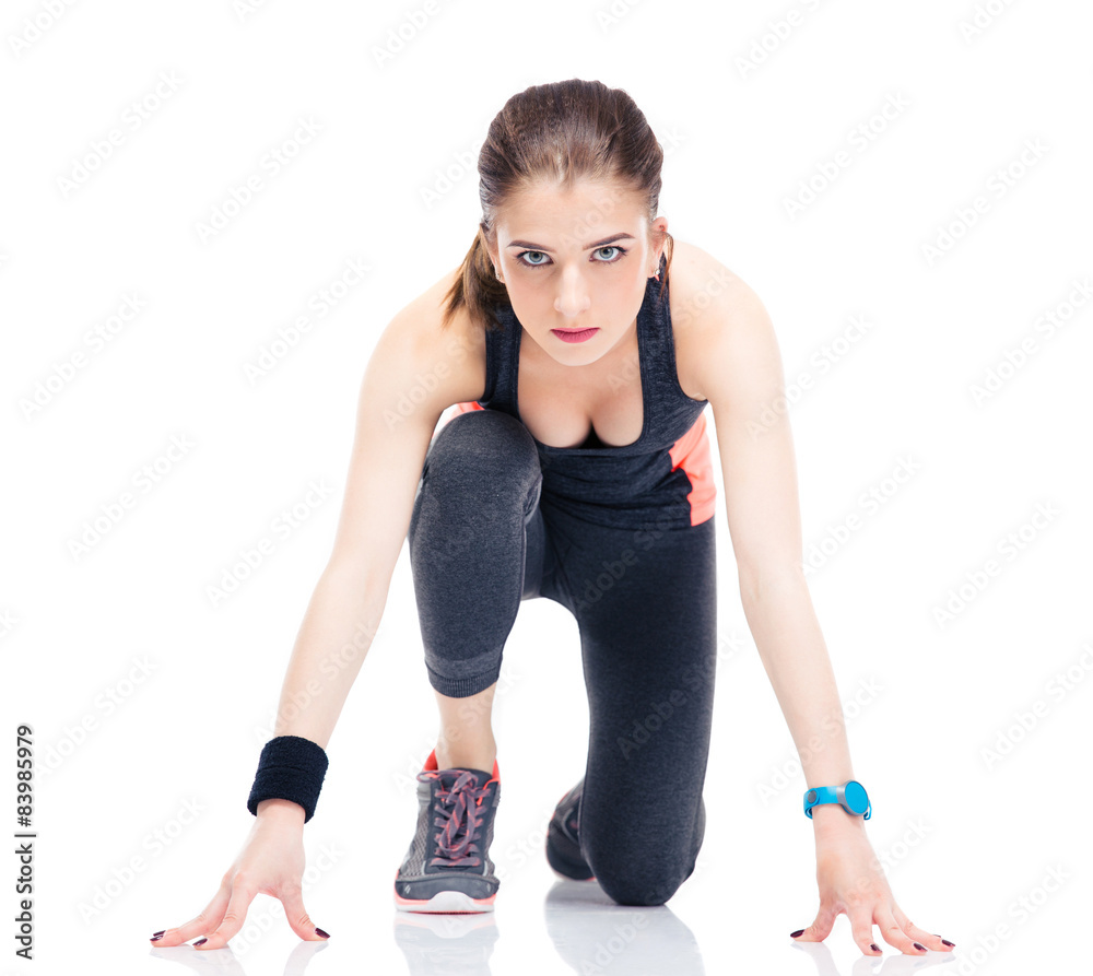 Runner sporty woman in start position Runner sporty woman in start position