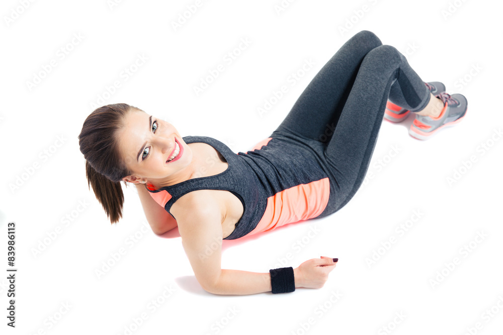 Happy sporty young woman lying on the floor Happy sporty young woman lying on the floor