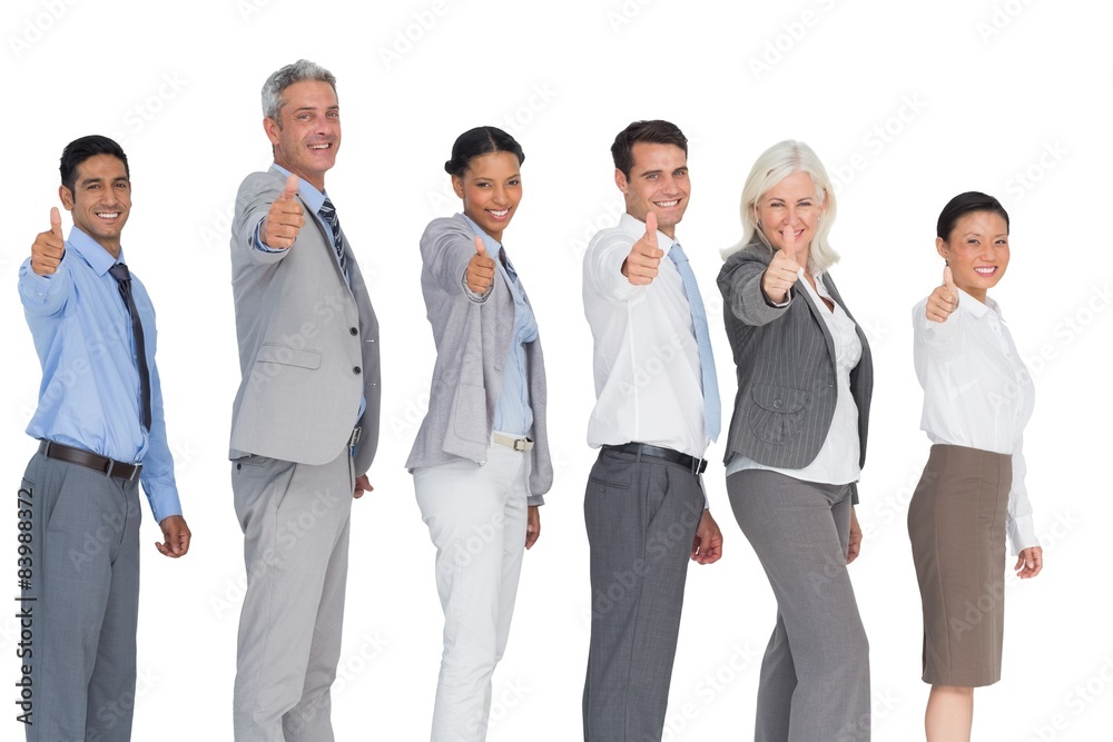 Happy business people looking at camera with thumbs up Happy business people looking at camera with thumbs up