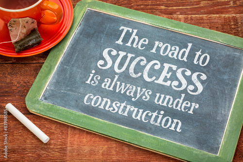 The road to success concept on blackboard