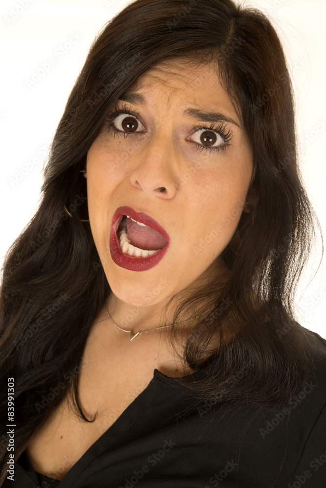 Attractive woman with crazy expression her large mouth open Attractive woman with crazy expression her large mouth open
