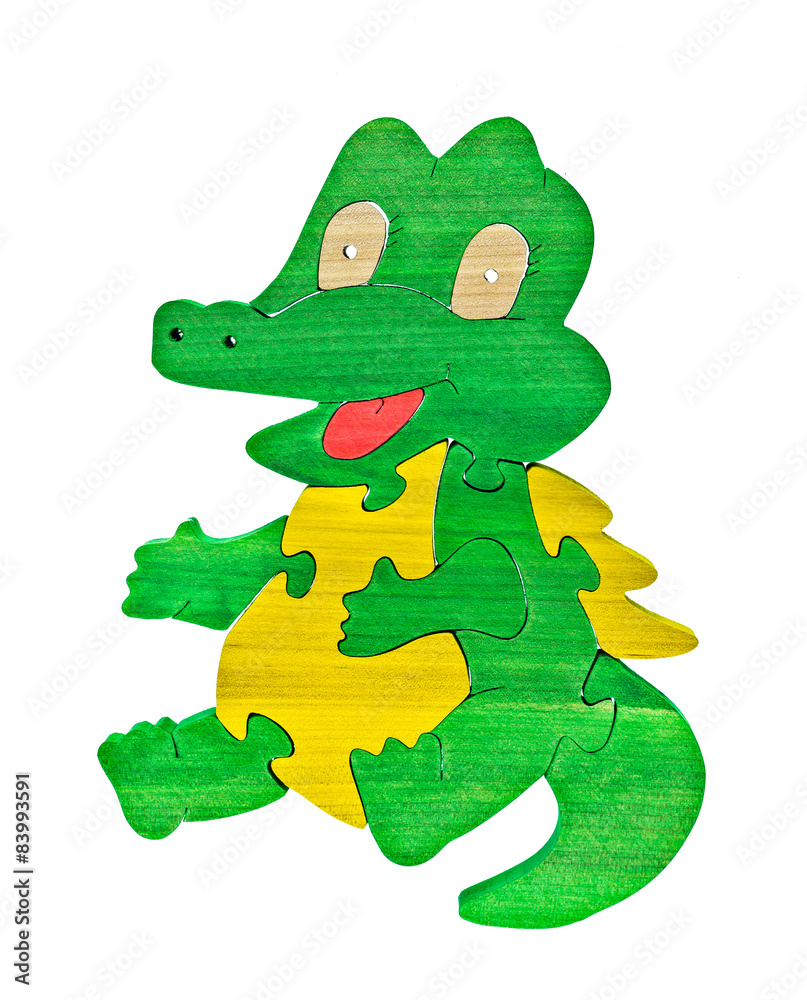 Naklejka premium Colorful wooden puzzle in crocodile shape on isolated background