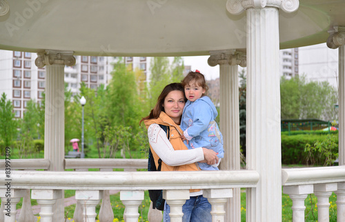 Mom and daughter 2.5 years for a walk in  gazebo