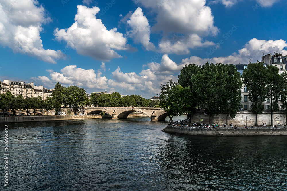 The picturesque embankments of the Seine River in Paris, France.