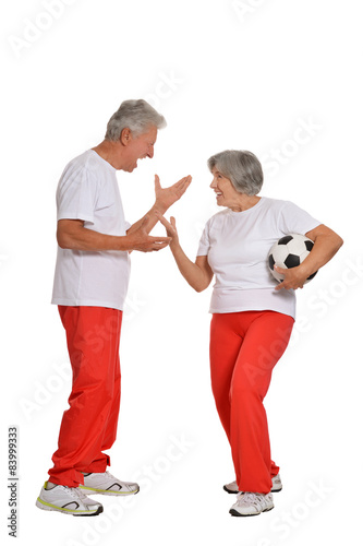 Senior couple with a ball