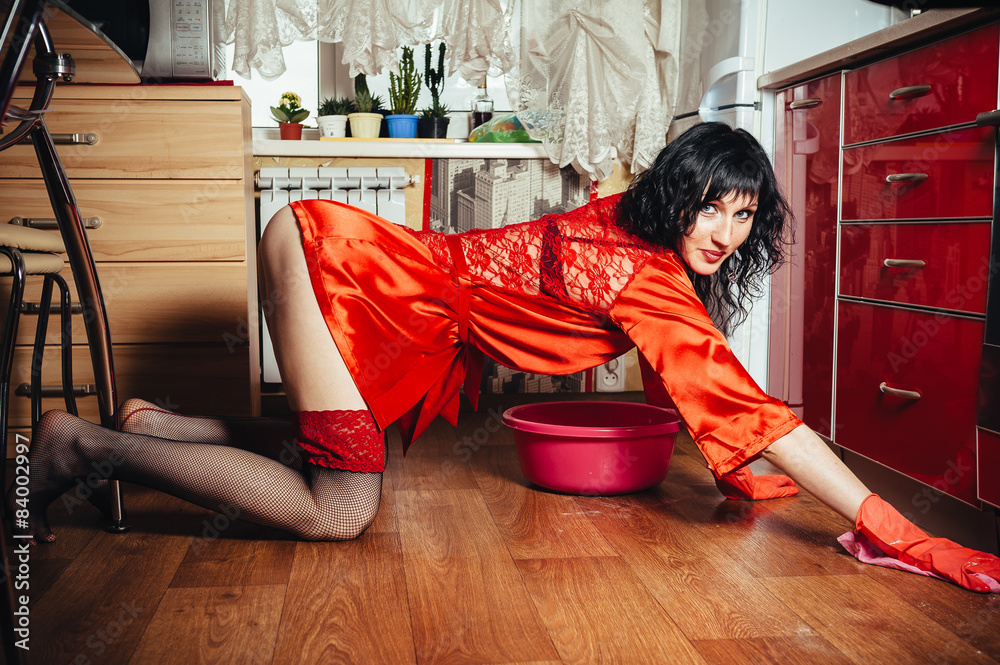 Sexy housewife cleaning floor in the kitchen, similar available Stock Photo  | Adobe Stock