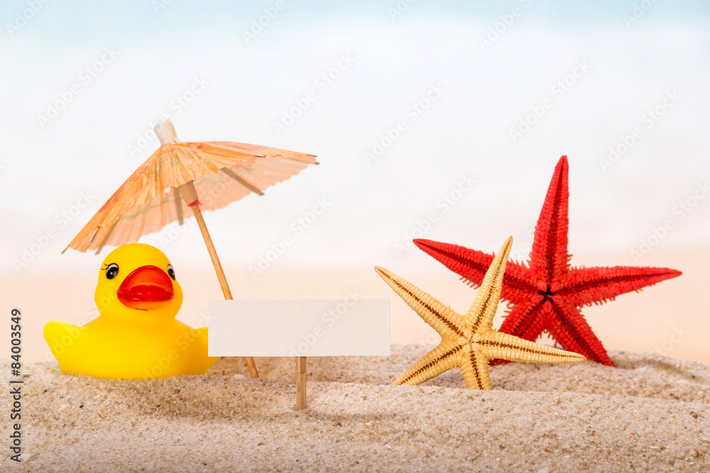 Fotografie Card, starfishes and umbrella