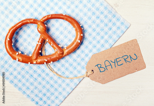 food background - pretzel on wood table - bavarian photo